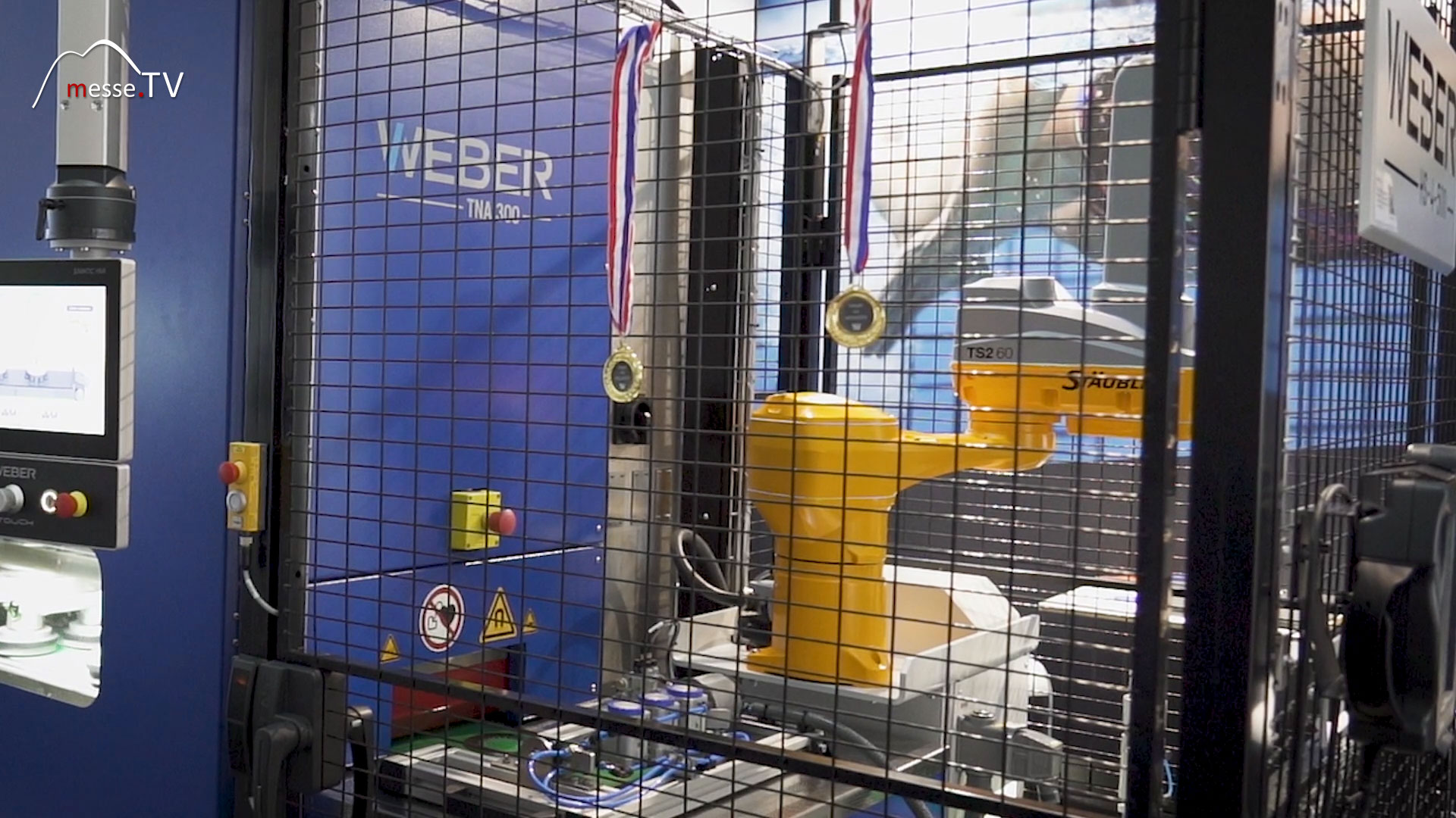 TNA 300 Entgratmaschine Vierachs Roboter Weber Maschinenbauunternehmen