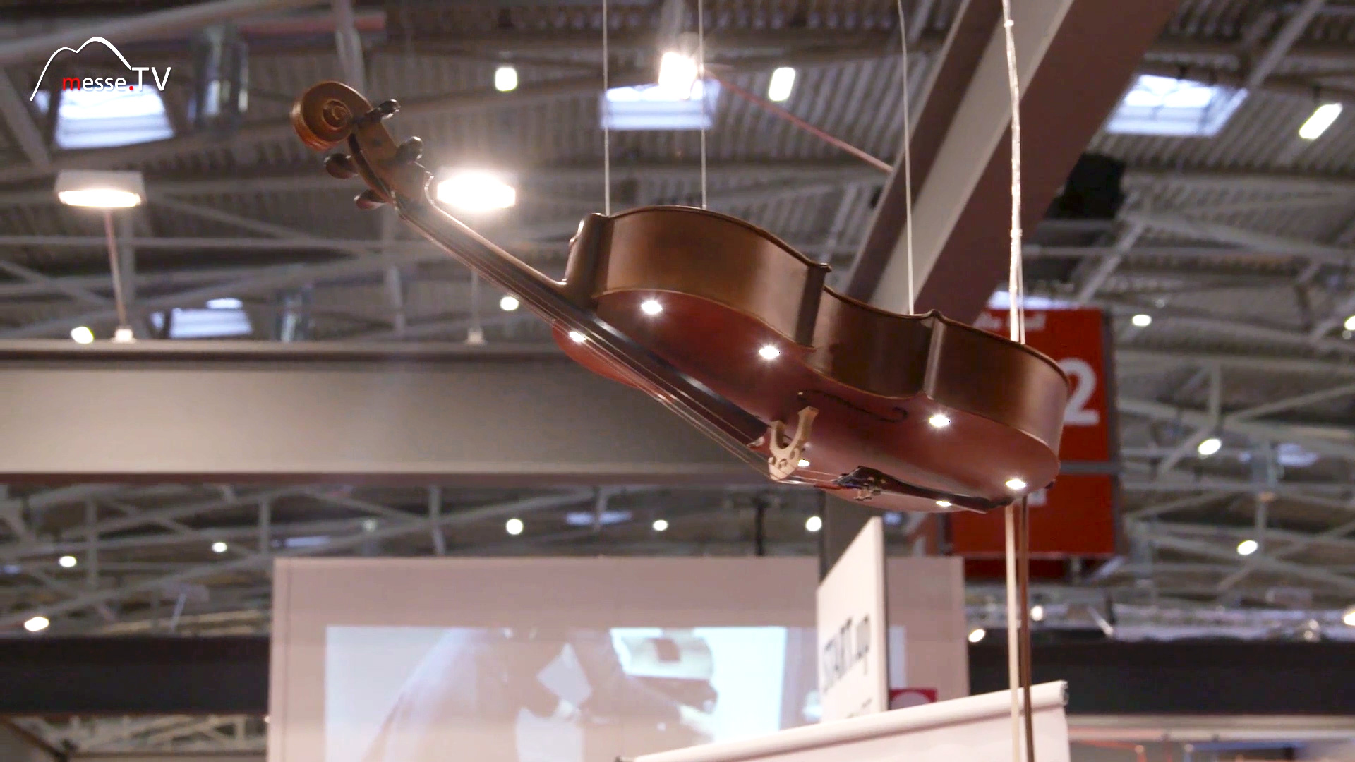 Ceiling lamp made from an old viola played out