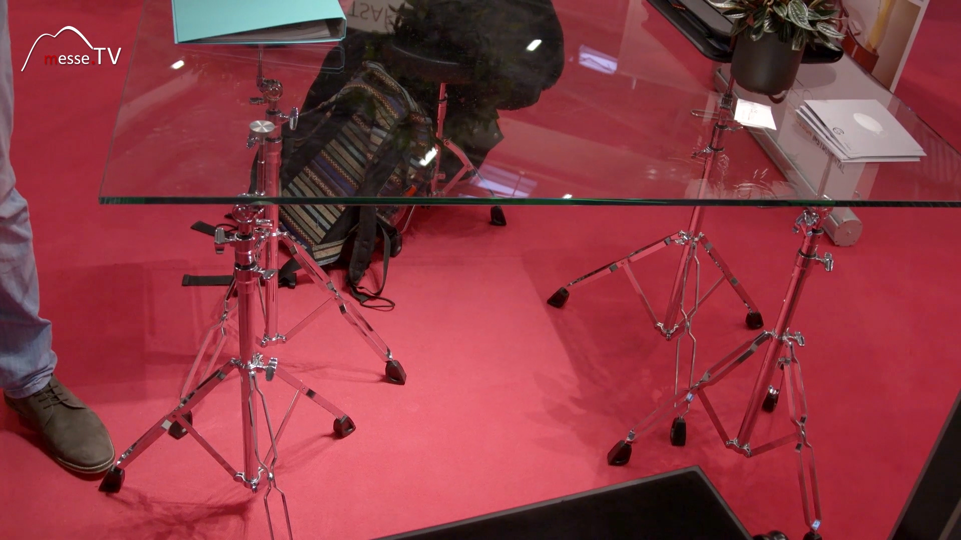 Glass table made from old drum stands played out