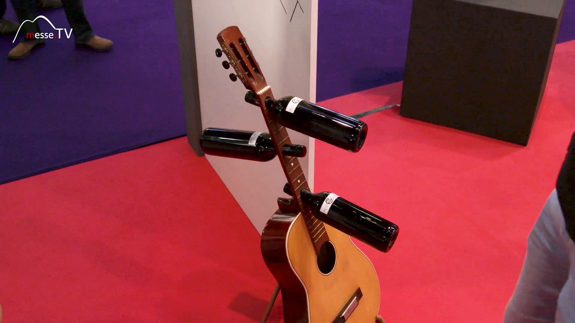 Guitar converted into a wine rack played out