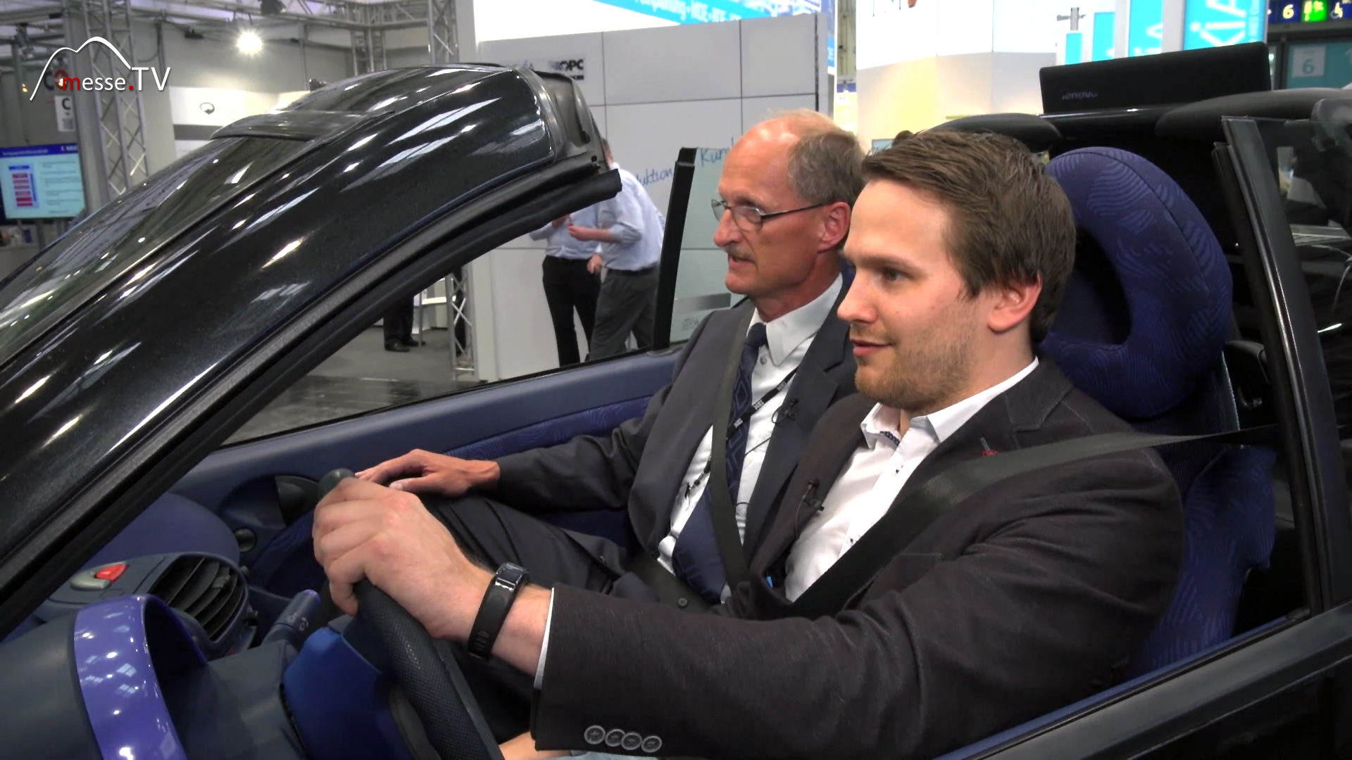 MesseTV Interview Dr Thomas Wedel in IBM driving simulator Hannover Fair