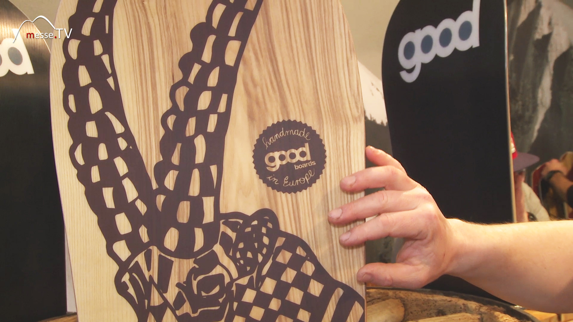 wooden snowboard with icorn motif good boards