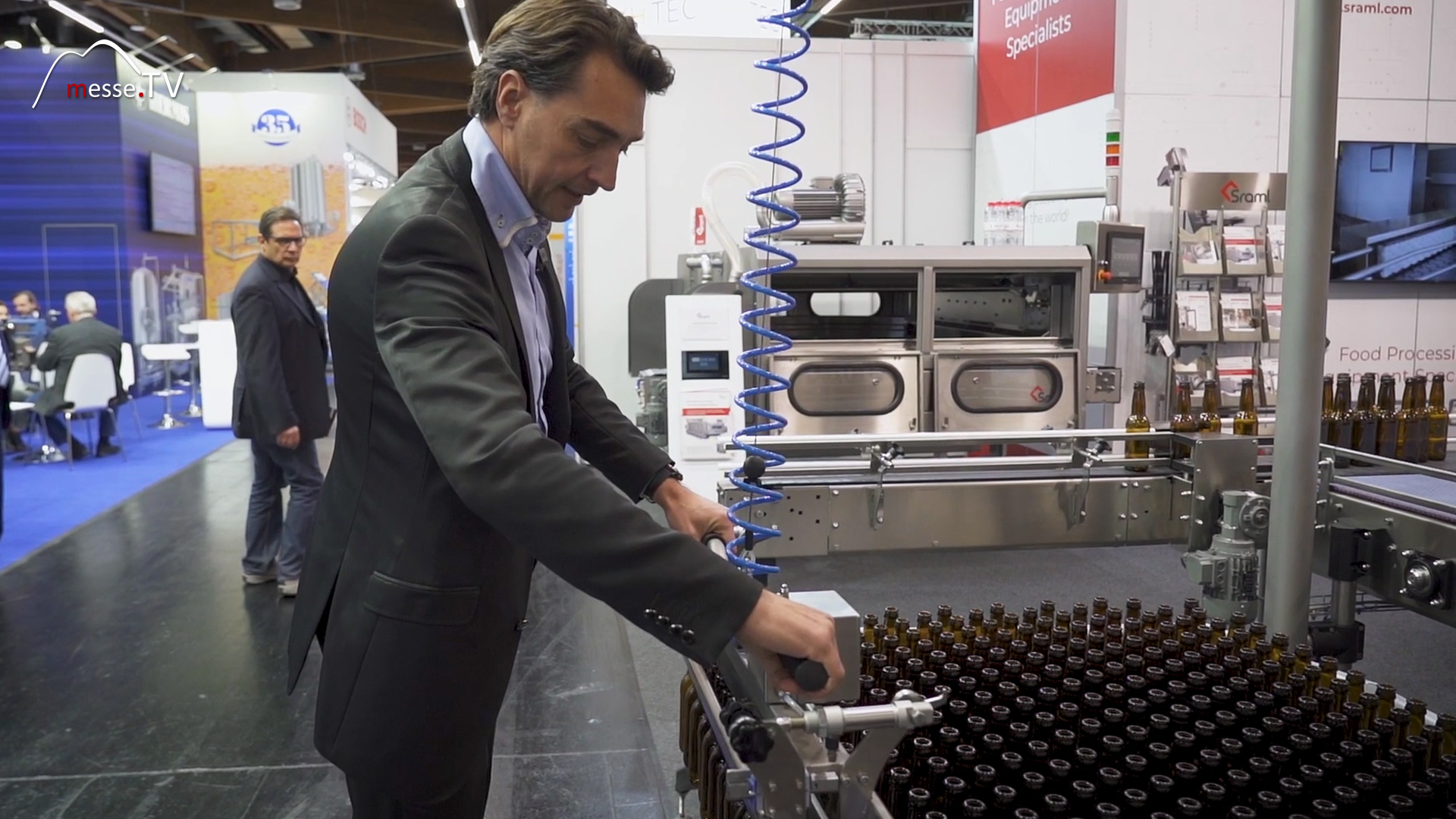 Denis Kebler filling bottles Sraml