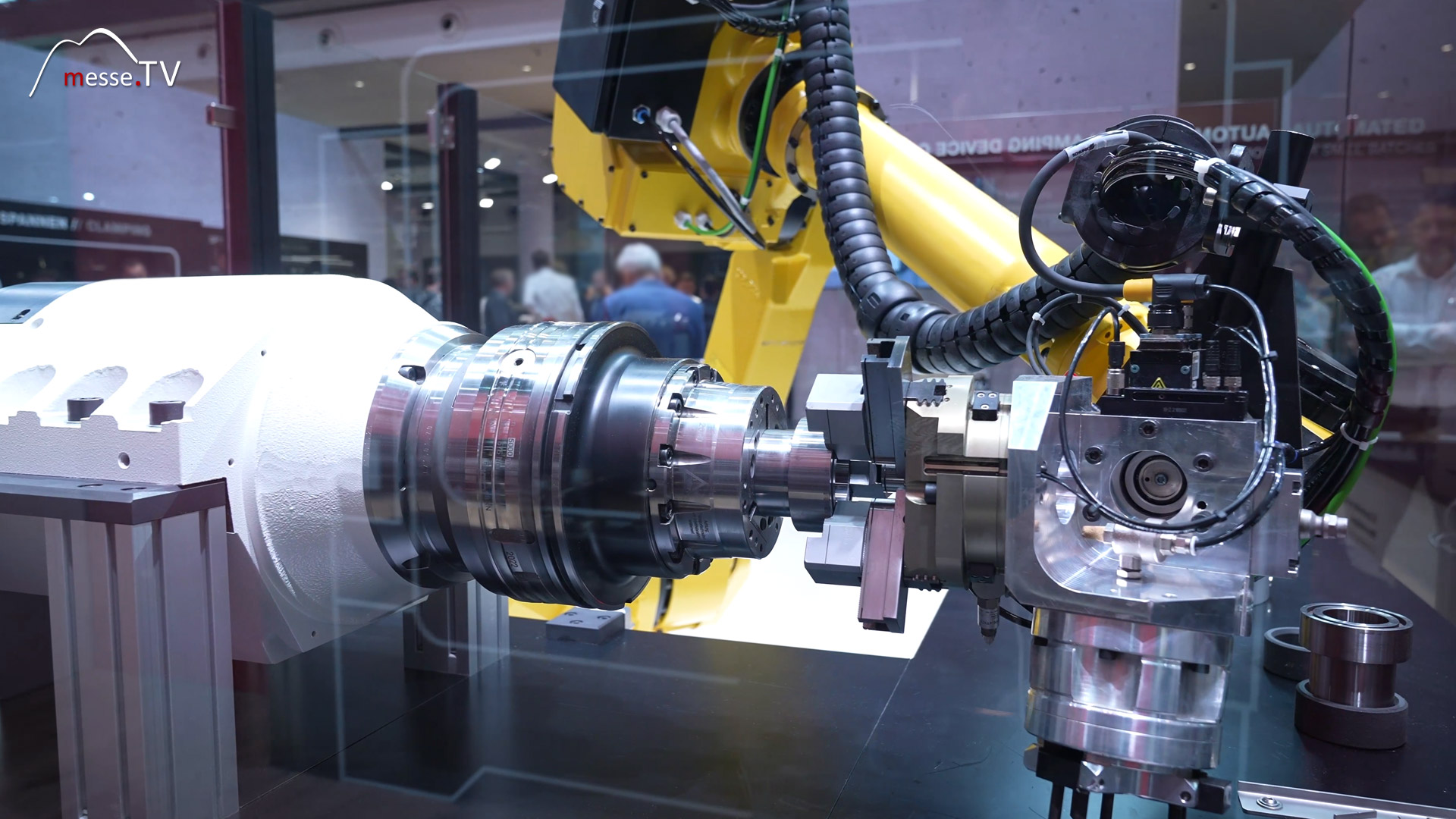 automated clamping tool change with robotic arm hainbuch clamping technology amb 2024