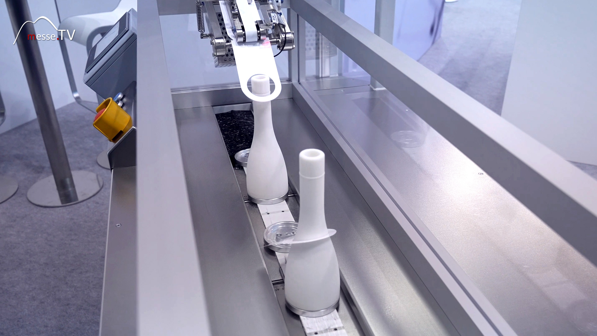 automation neck hanger bottles for food and pharmaceutical sectors fachpack 2024