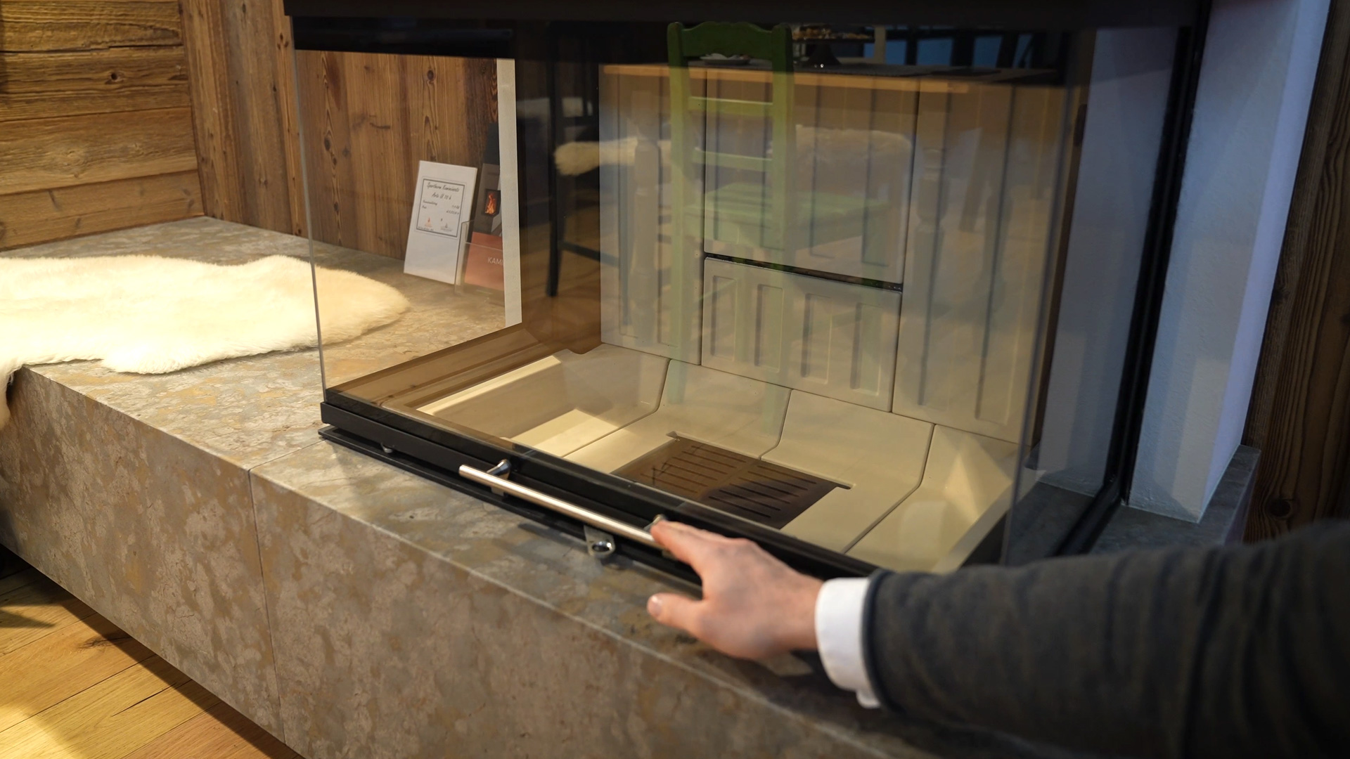 natural stone stove across the entire width neumaier stove construction and stainless steel handle and pull controls