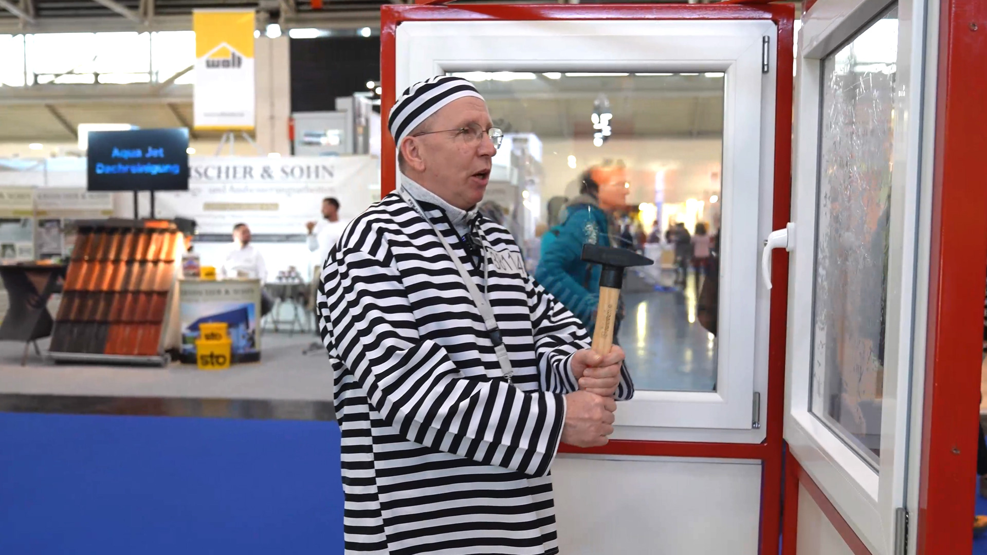 prevention of burglary via polycarbonate pane in window pane demonstration with hammer