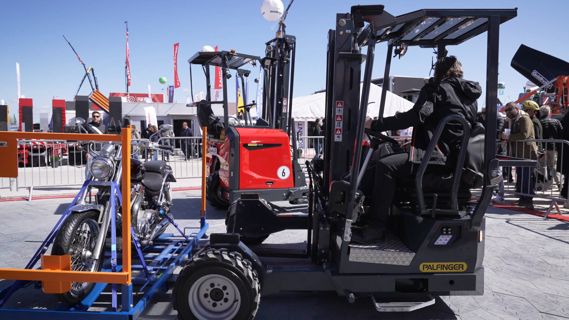ergonomically angled swivel seat for relief when reversing palfinger portable forklift
