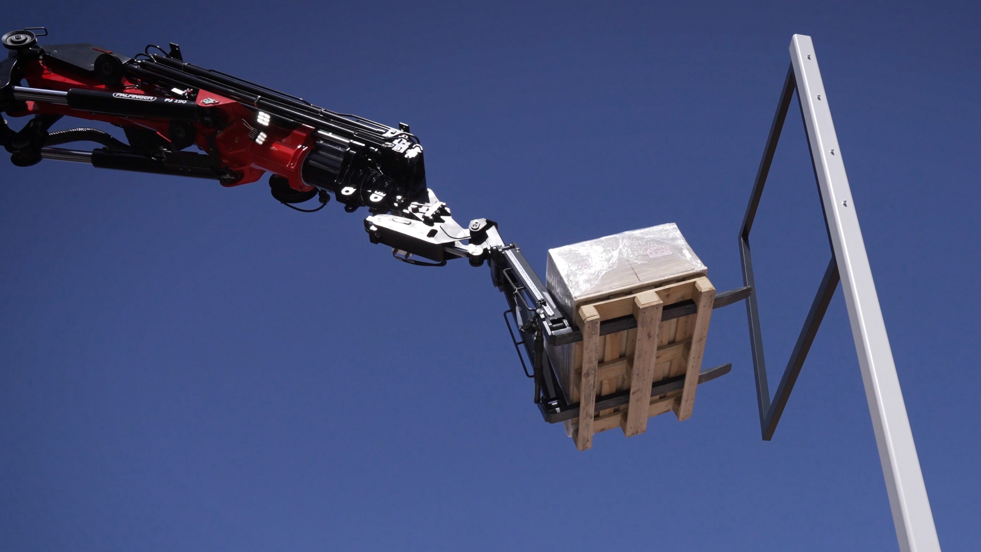 exact positioning of pallets at large outreach demonstration 1 loading crane pk 880 tec palfinger