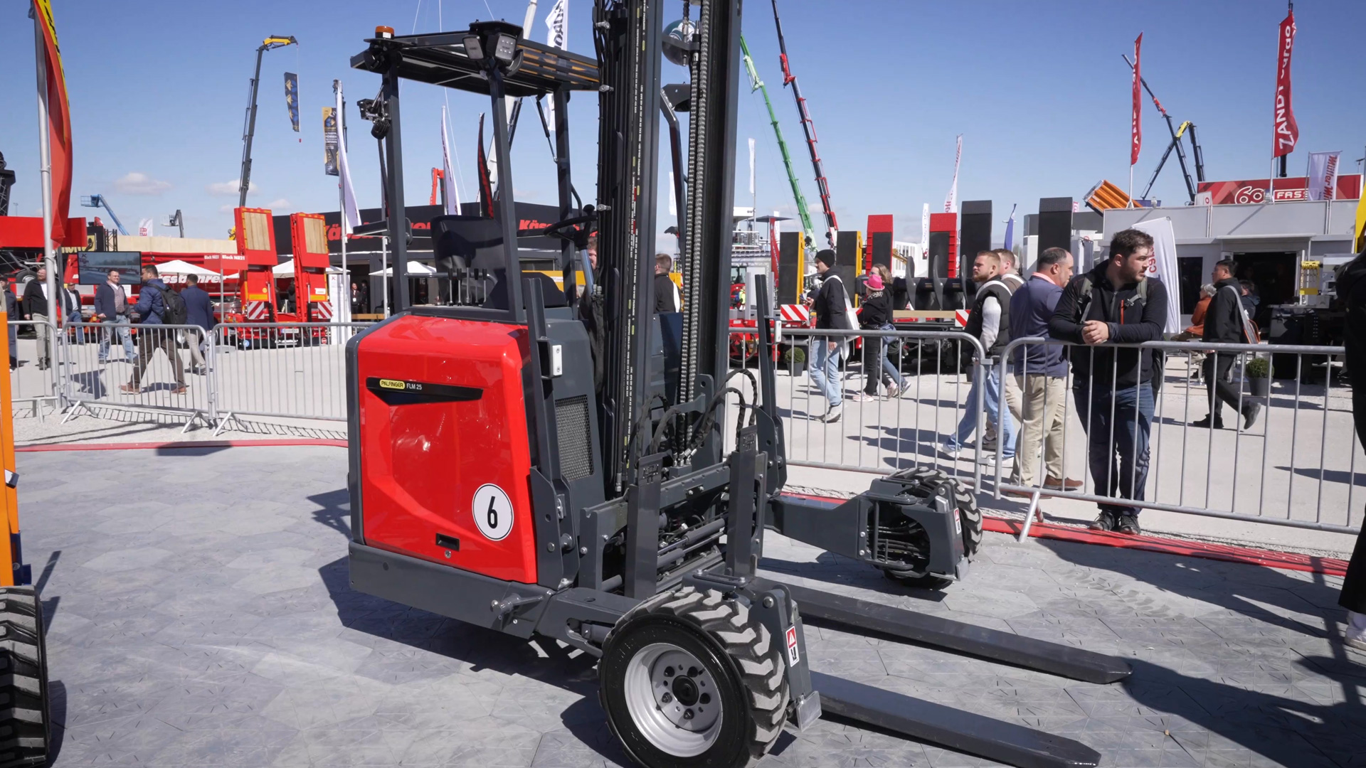 portable forklift truck with 180 degree steering angle for narrow loading areas and quick turning maneuvers palfinger
