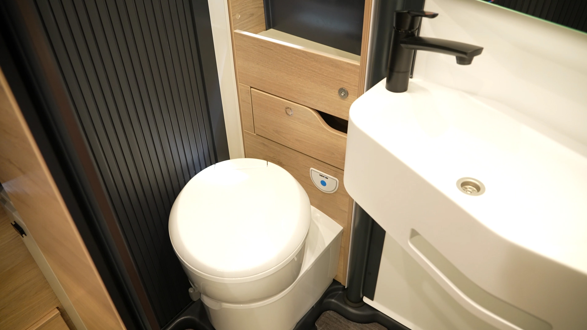 Bathroom with pivoting wall system