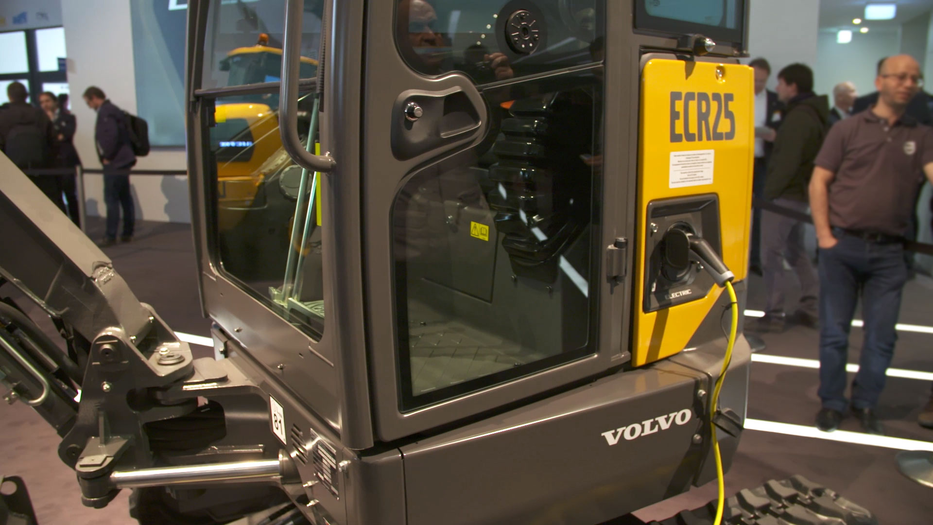 Electric excavator on charging cable