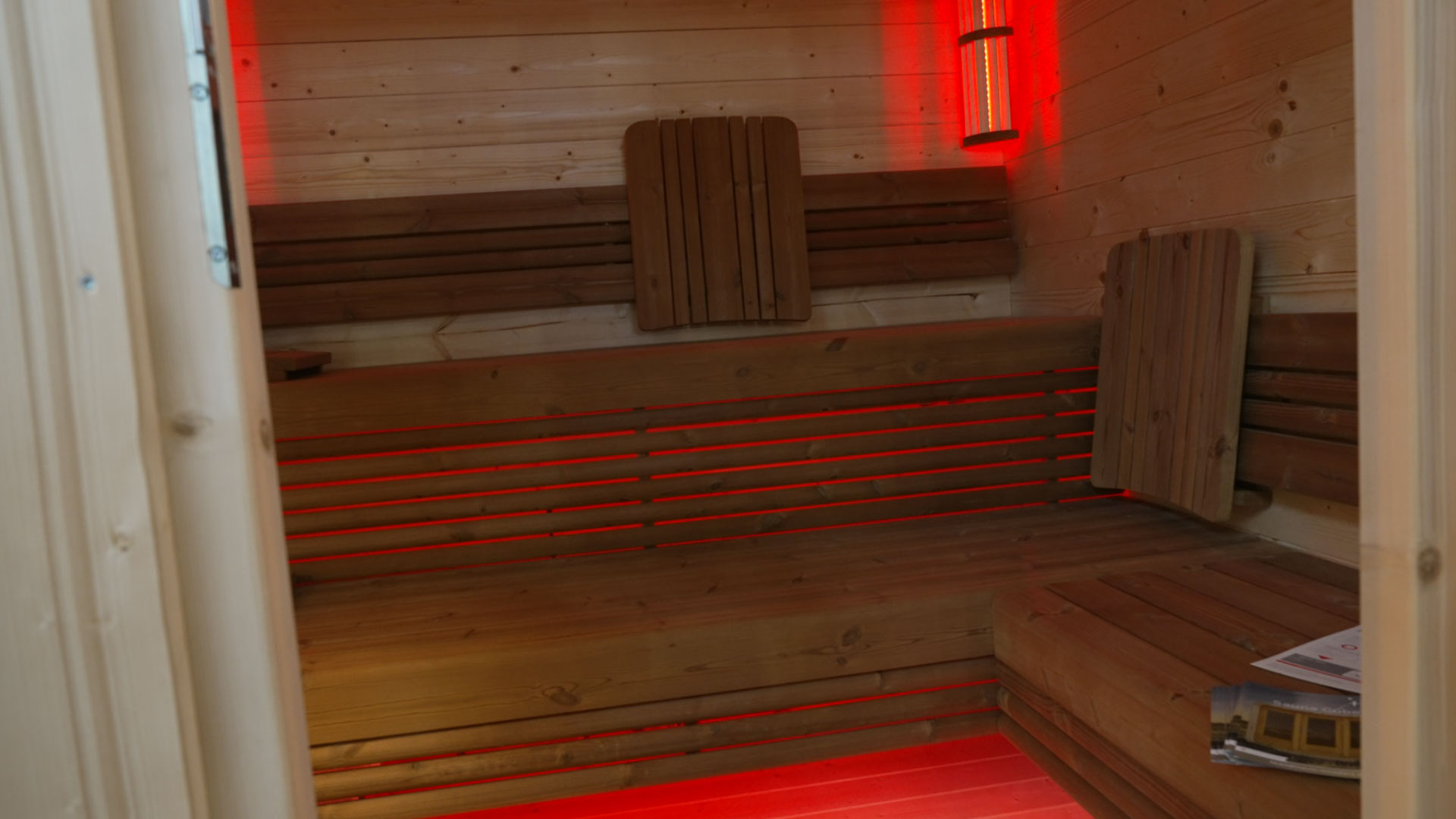 Sauna with seating and reclining area